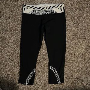 Black with white accents, Lululemon leggings, size 10